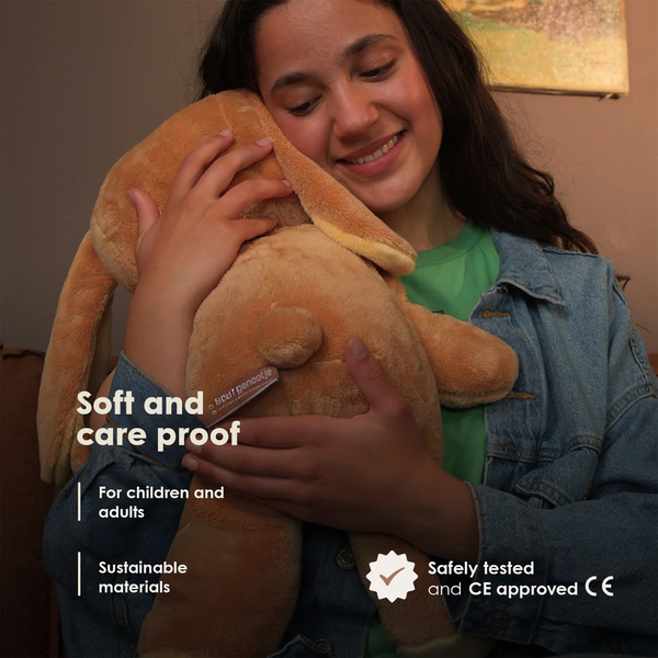 Who are Lotgenootje weighted cuddly toys intended for?